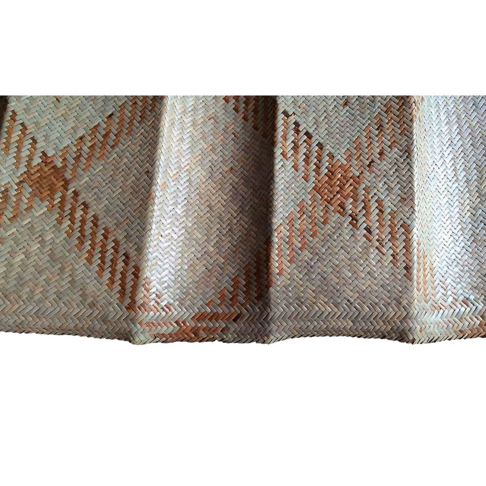 “Handwoven Rattan Sheetal Pati placed on floor – Eco-Friendly Natural Madur Mat for Bedroom and Home Use”