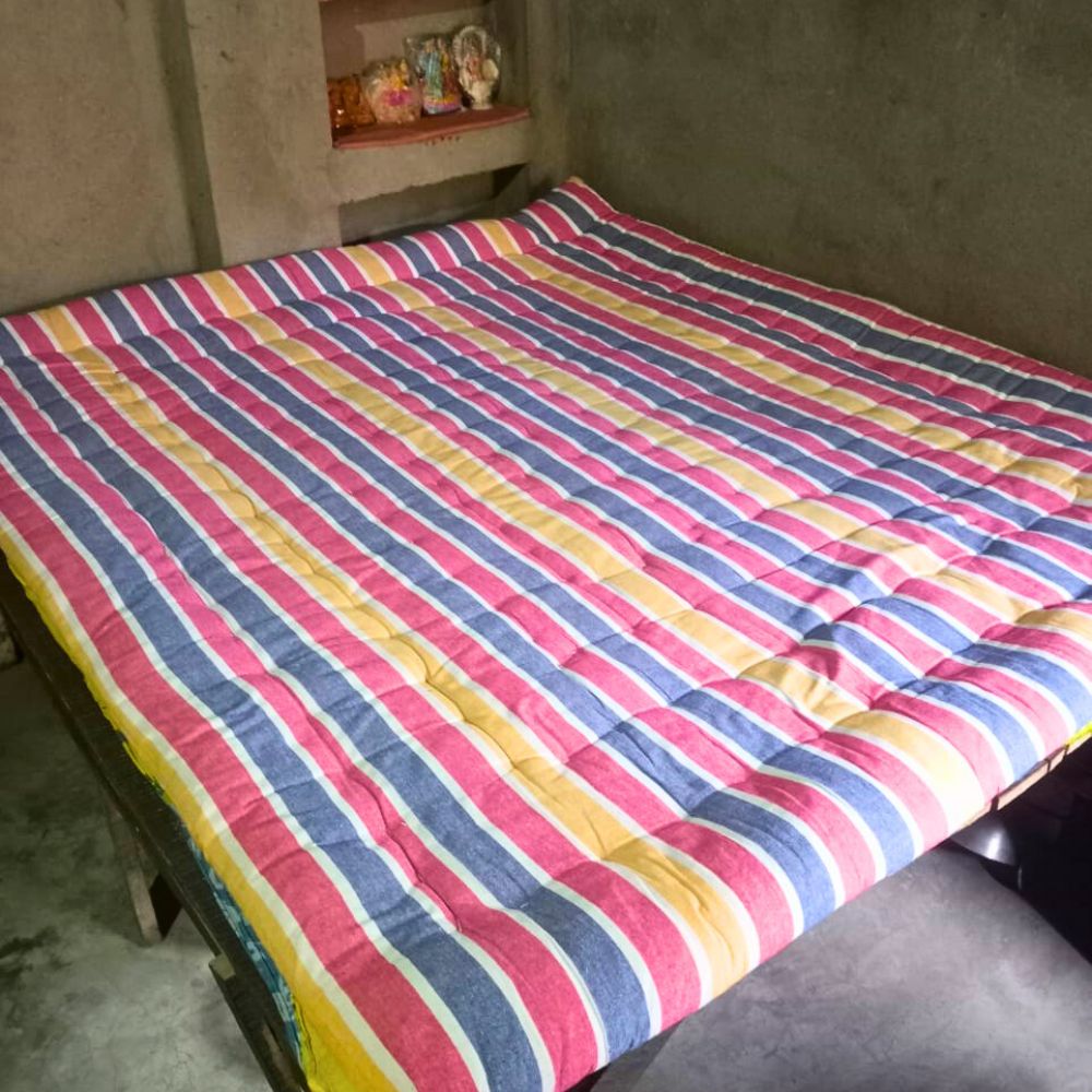 “Handmade Cotton Tosok by Basanti Bedding – Original Tulor Gadda stitched with care and traditional craftsmanship”